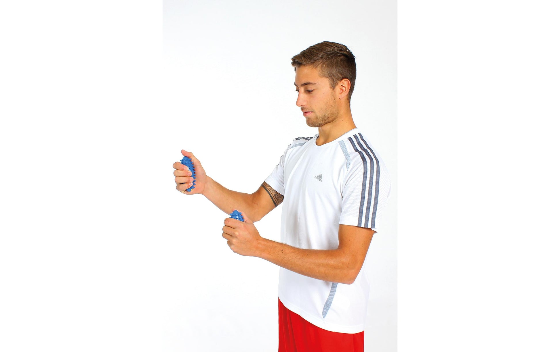 TOGU Massageball Hand Trainer Plus – 11 × 5 cm – 250 g – pink – Kunststoff