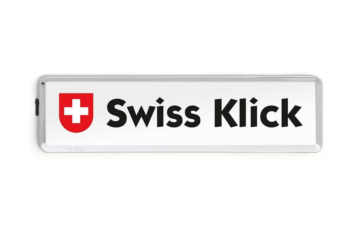 Swiss Klick Kennzeichenhalter Langformat – Schwarz, Kunststoff, Chrom Glanz