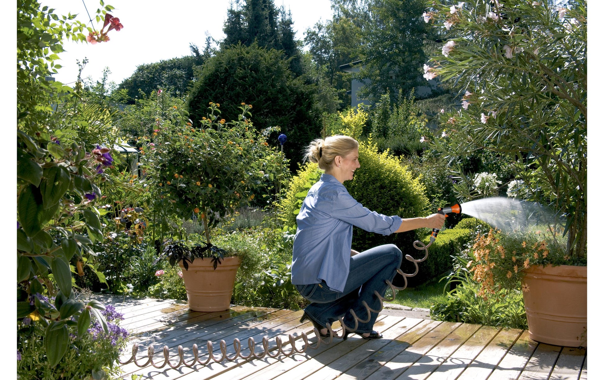 Gardena Spiralschlauch – 10 m, flexibel, Farbe grau, orange, mit Ausguss