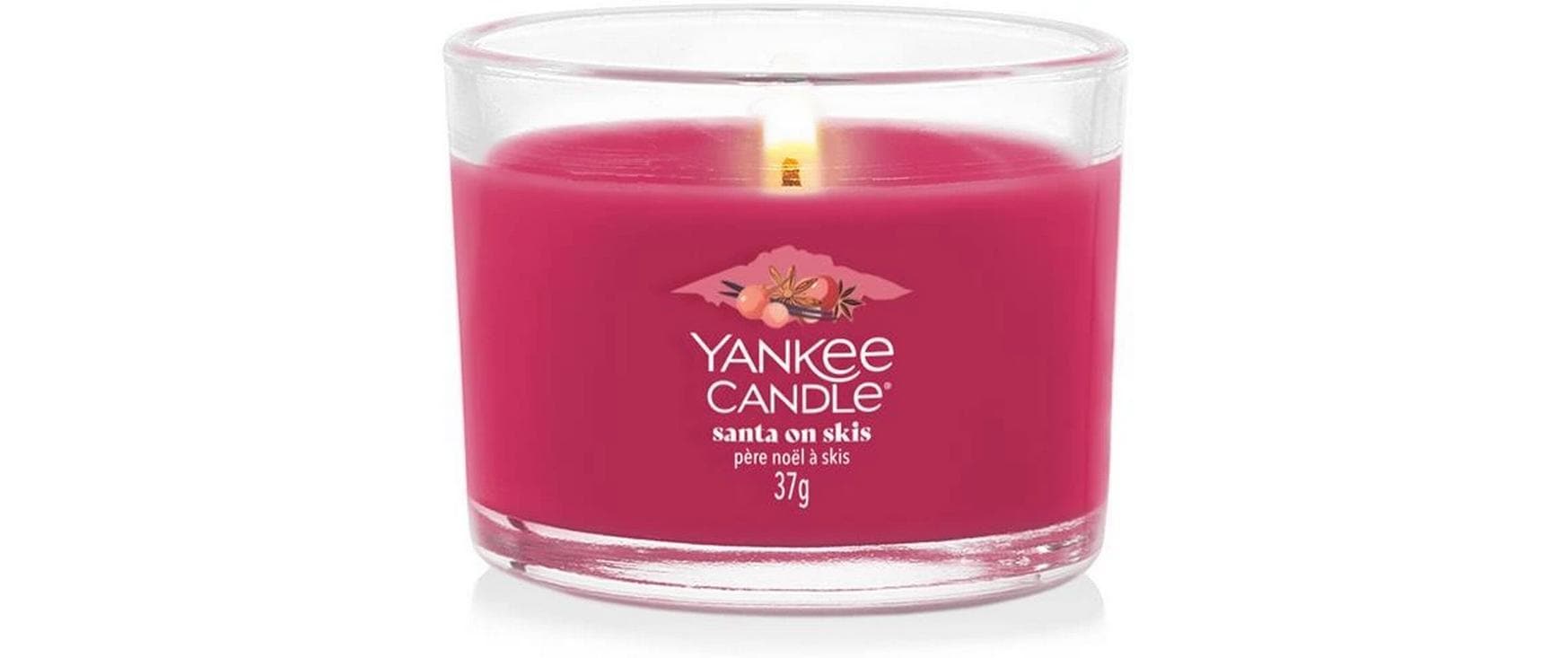 Yankee Candle Santa auf Skiern Blaubeere – Duftkerze, Votivkerze im Glas, 7–10 h