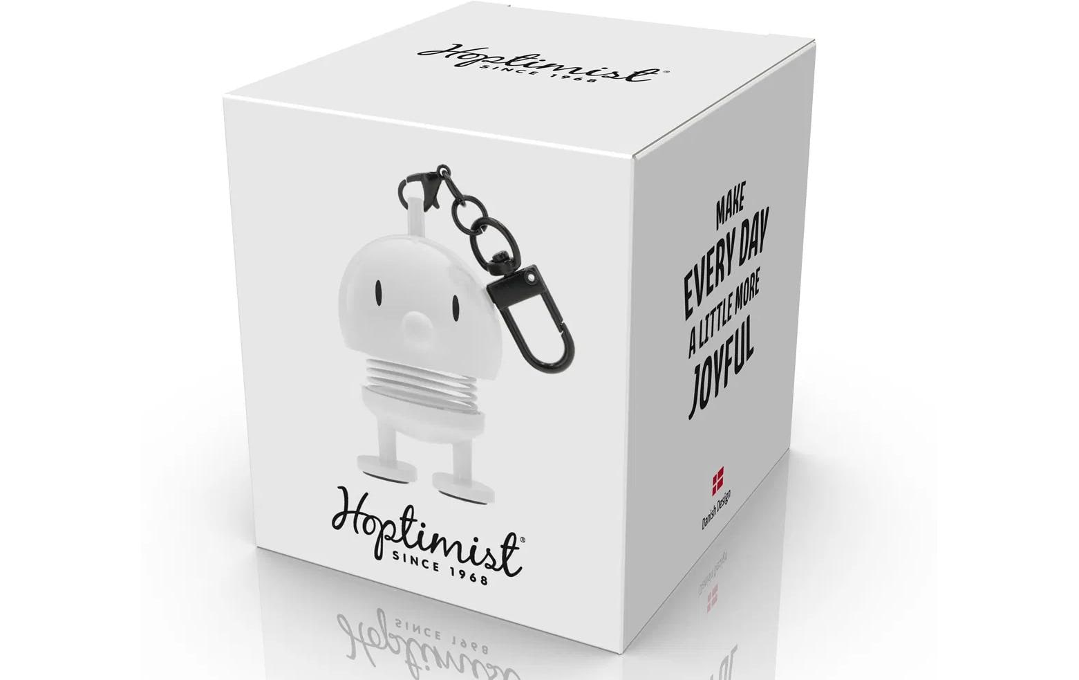 Hoptimist Gepäckanhänger – 4×3,4×5,9 cm – Weiss – ABS, Stahl – Figur