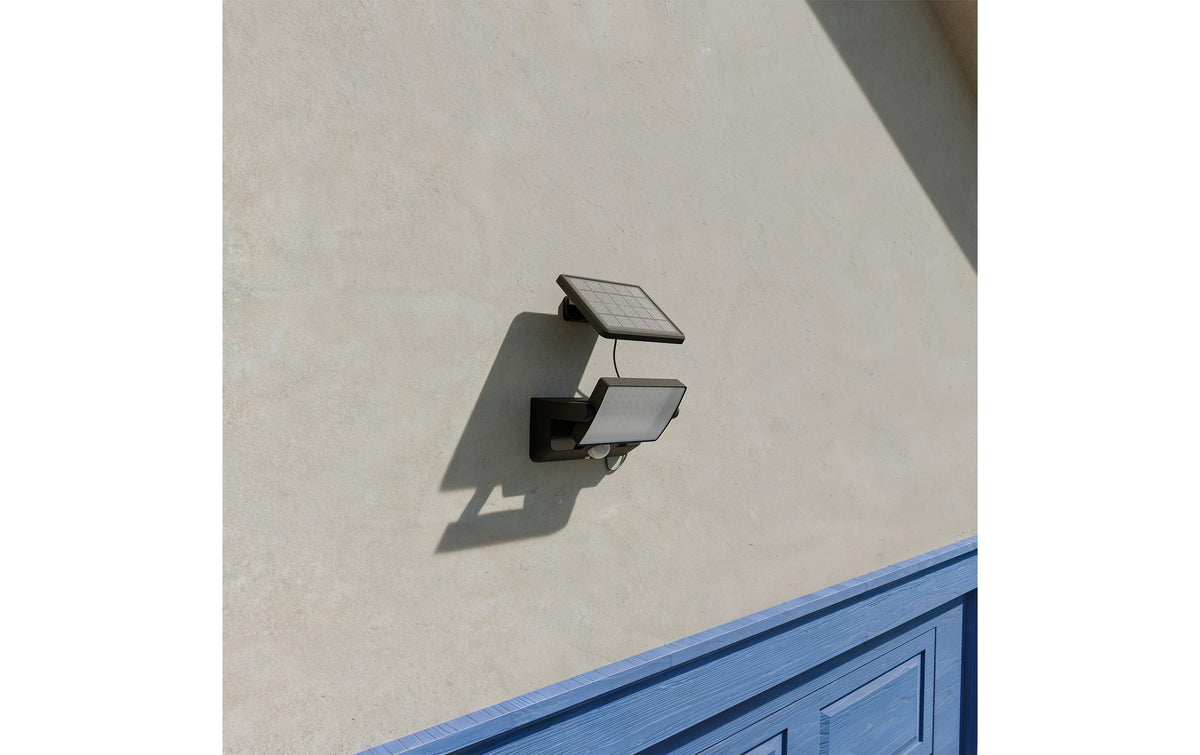 Philips by Signify Philips Aussenwandleuchte – 3000 K – IP44 – Netzbetrieb – mit Bewegungsmelder – Schwarz – Kunststoff