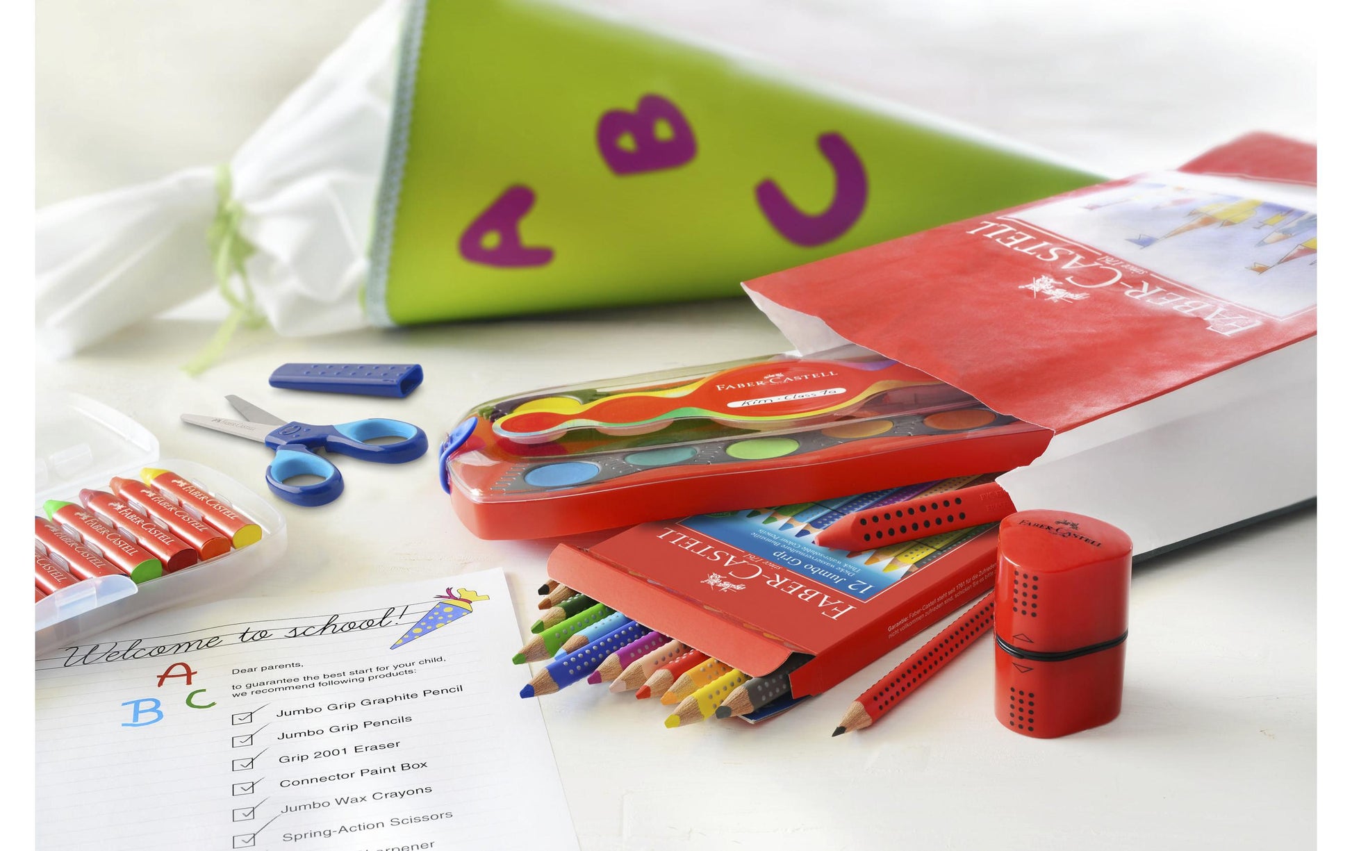 Faber-Castell Grip Kinderschere, abgerundet, für Rechts- und Linkshänder – Softgrip, Klingenschutz, Blau