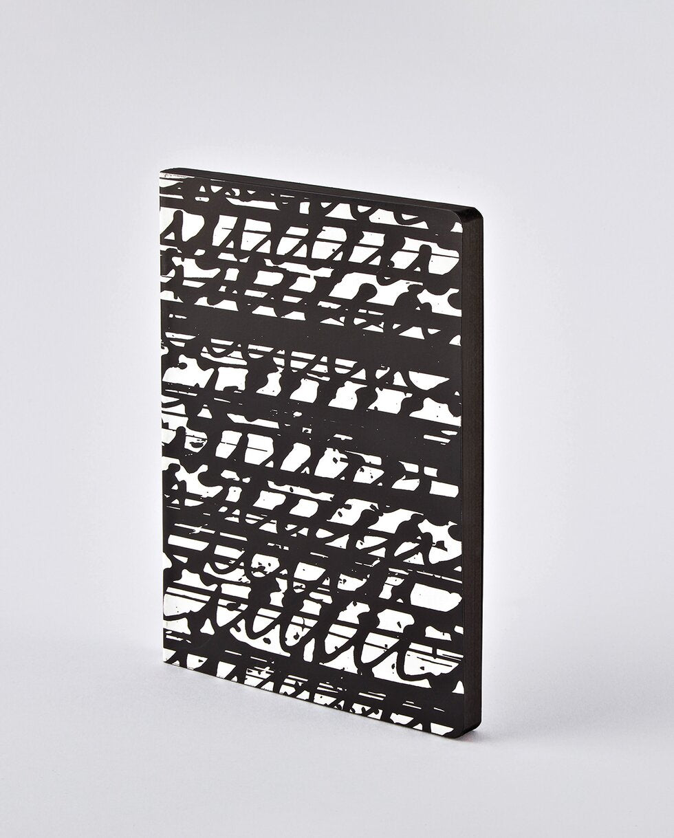 nuuna Notizbuch – A5 – punktiert – 176 Seiten – 120 g/m² – Softcover, Fadenheftung, nummeriert – schwarz/weiß