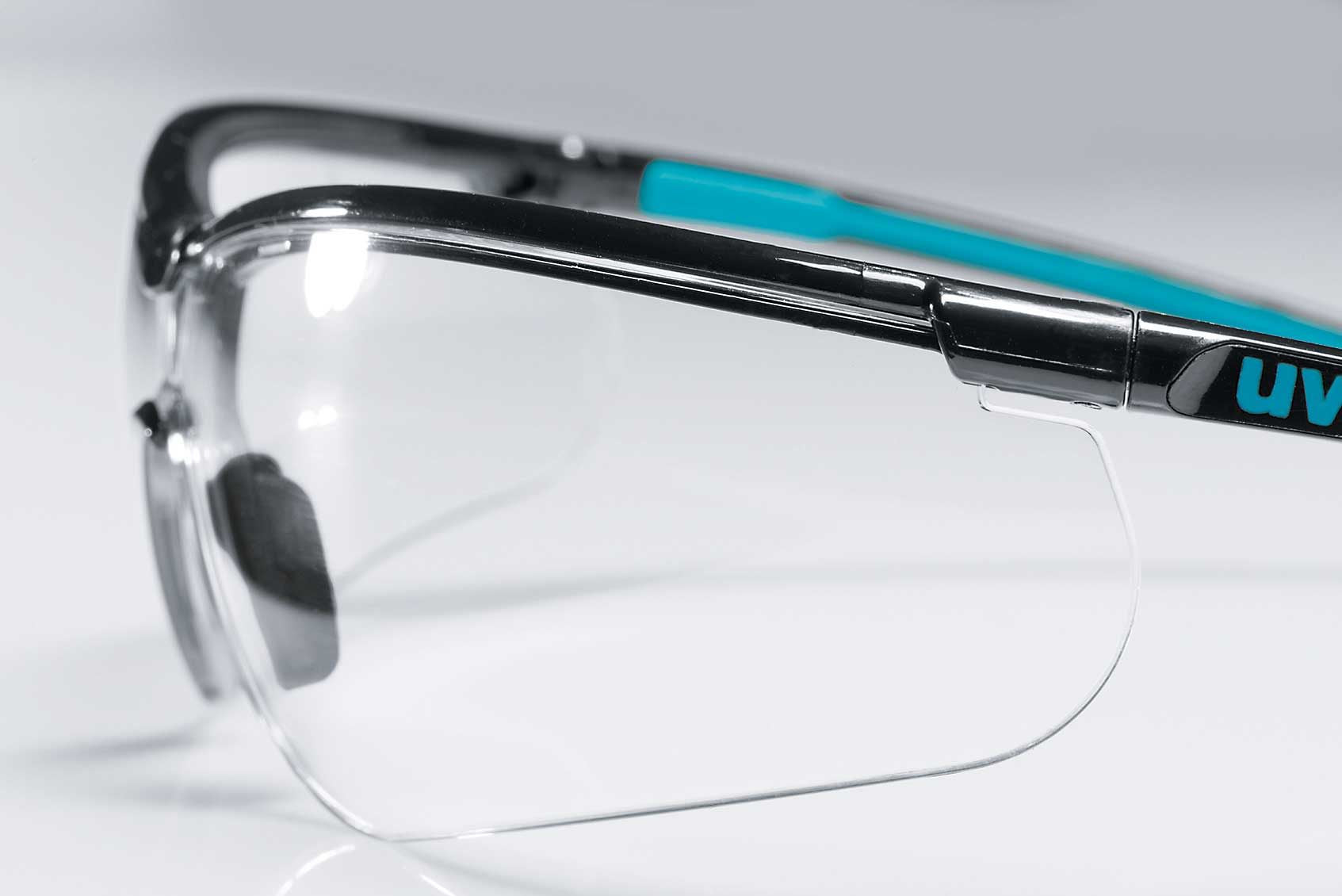 Uvex Schutzbrille – klar, UV-Schutz, schwarz, blau
