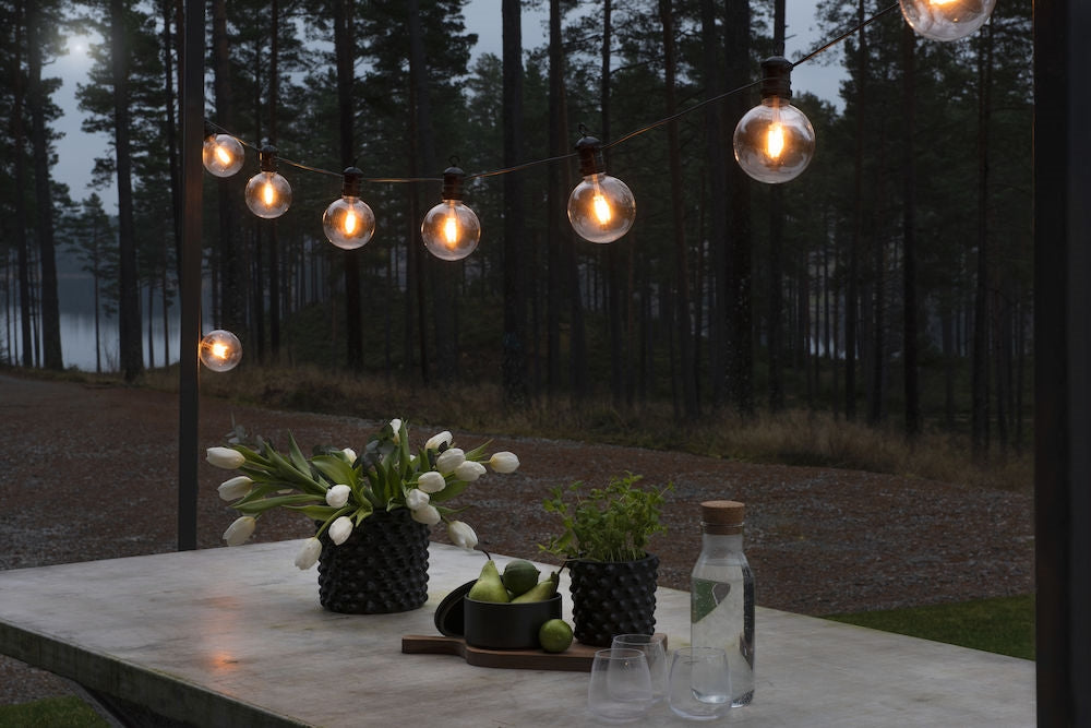Konstsmide Lichterkette – 46 lm, 7 W – Bernstein, 1800 K – IP44 – Netzbetrieb, dimmbar – Schwarz, Kunststoff