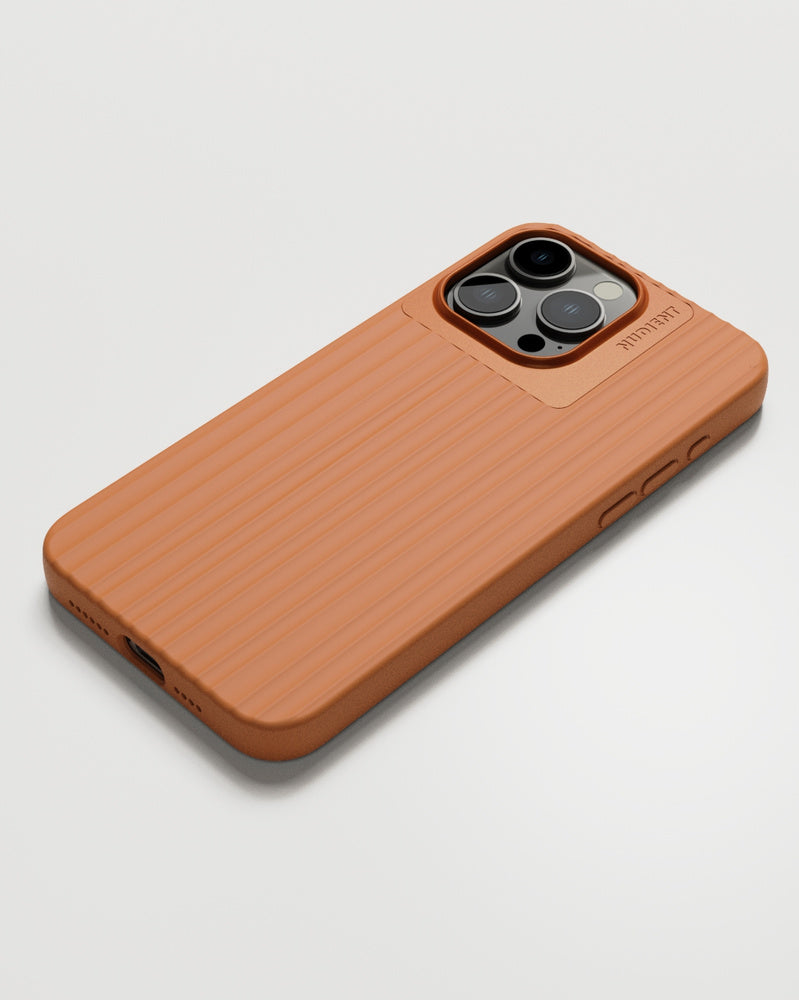 Nudient – Backcover – für Apple iPhone 15 Pro Max – orange – kabelloses Laden