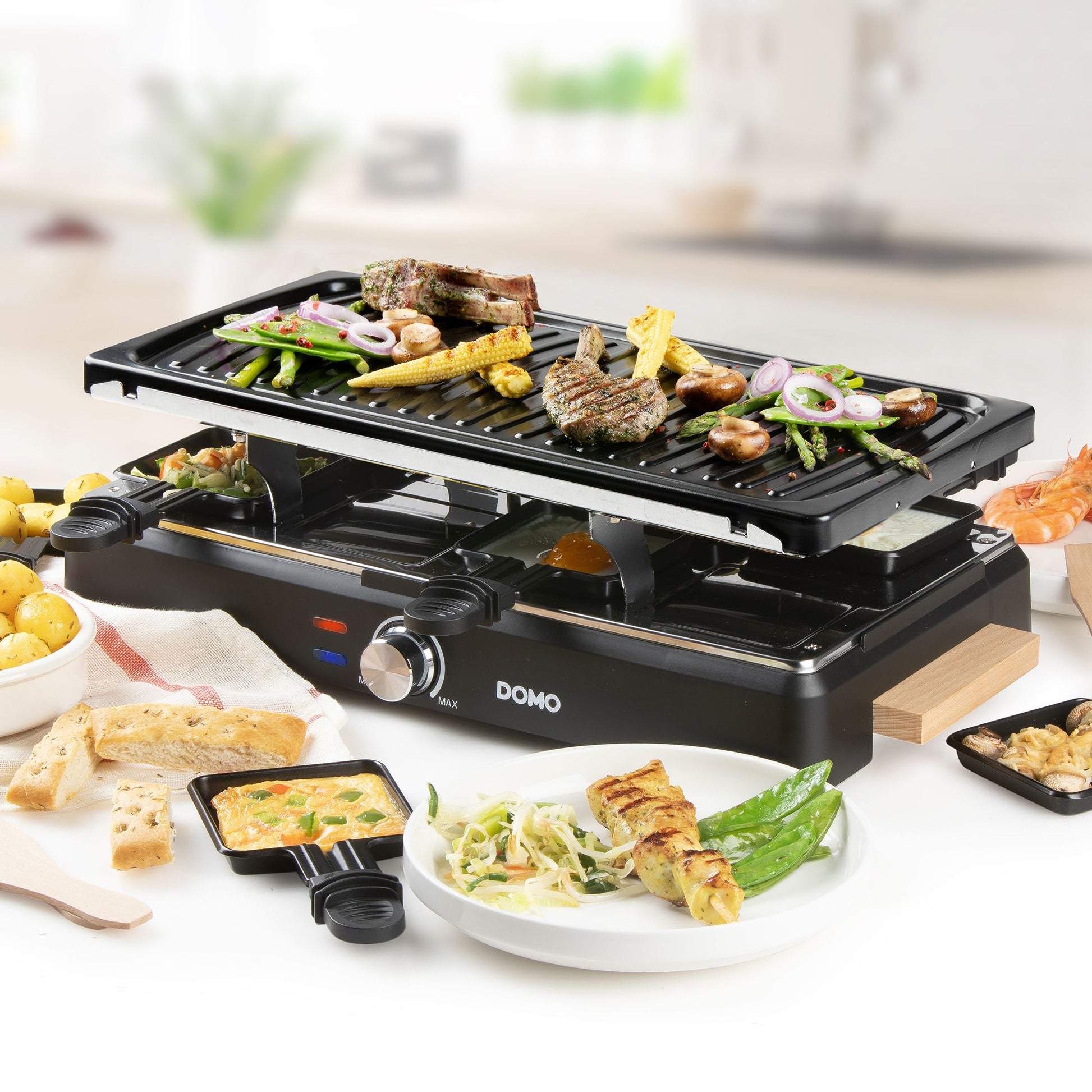 Domo Raclette DO9294G – 8 Personen, Keramik-Grillplatte, 1400 W – schwarz