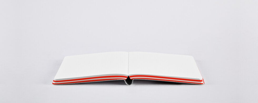 nuuna Notizbuch – A6 – punktiert – 176 Seiten – 120 g/m² – Softcover, Fadenheftung, nummeriert – rot/weiß