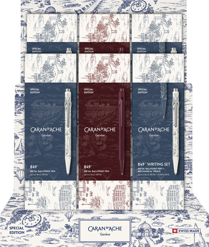 Caran d'Ache 849 Toile de Jouy Kugelschreiber – 12er Display, sortierte Farben, Druckmechanik, nachfüllbar